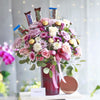 Roses and Chocolates in a Glass Container with Lid