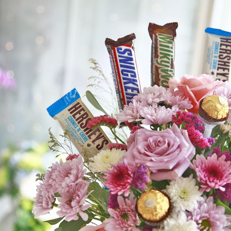 Roses and Chocolates in a Glass Container with Lid